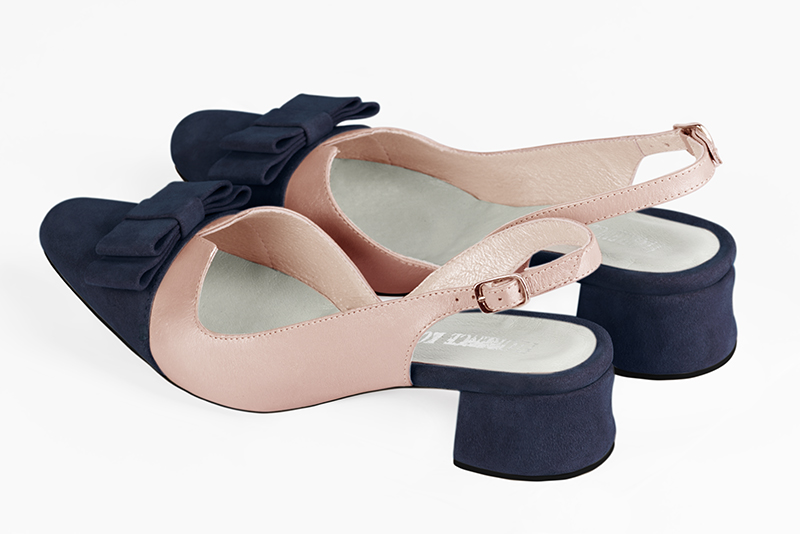 Navy blue and powder pink women's open back shoes, with a knot. Round toe. Low flare heels. Rear view - Florence KOOIJMAN